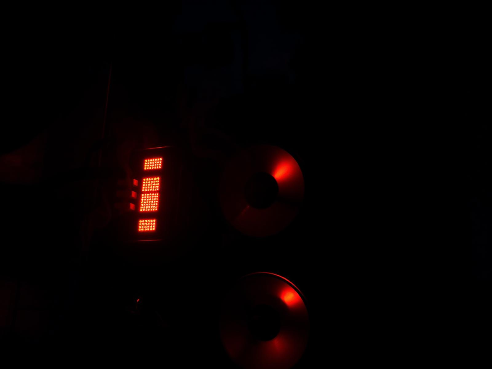 Room lit red — where the songs are being built